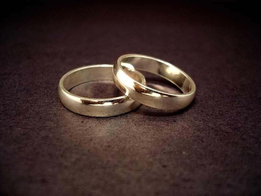 a photo of two wedding bands